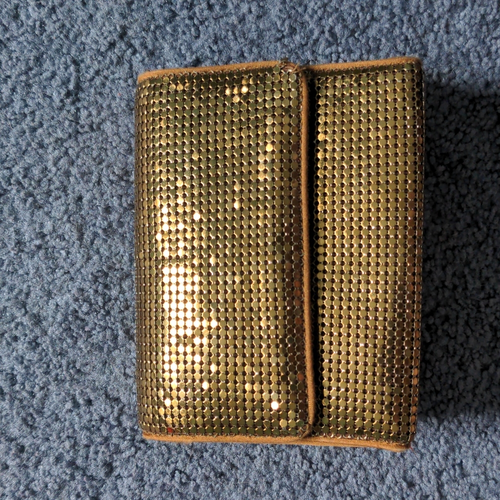 Amanda Smith gold clutch